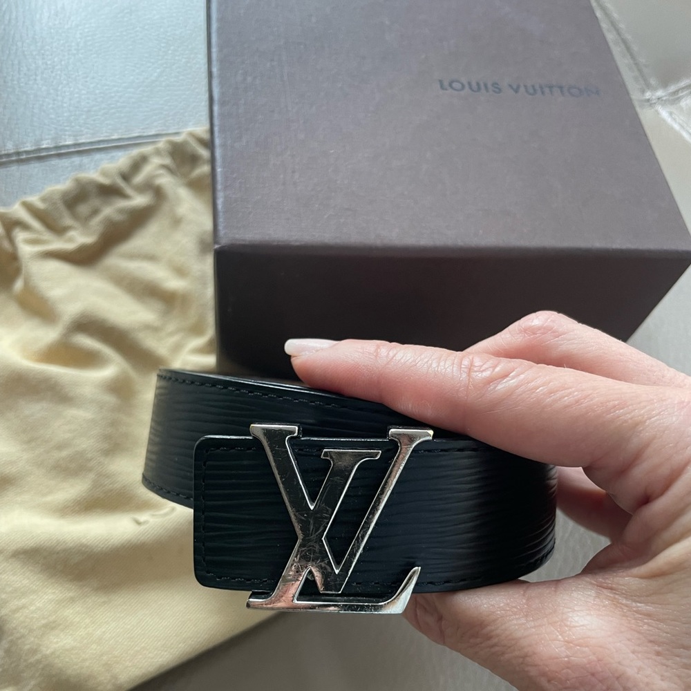 Louis Vuitton black leather belt with silver LV initials